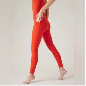 ATHLETA Transcend Stash Tight Leggings in Larkspur Red (Orange) Size M NWT